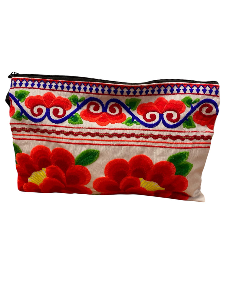 Ruby red poppy on white clutch