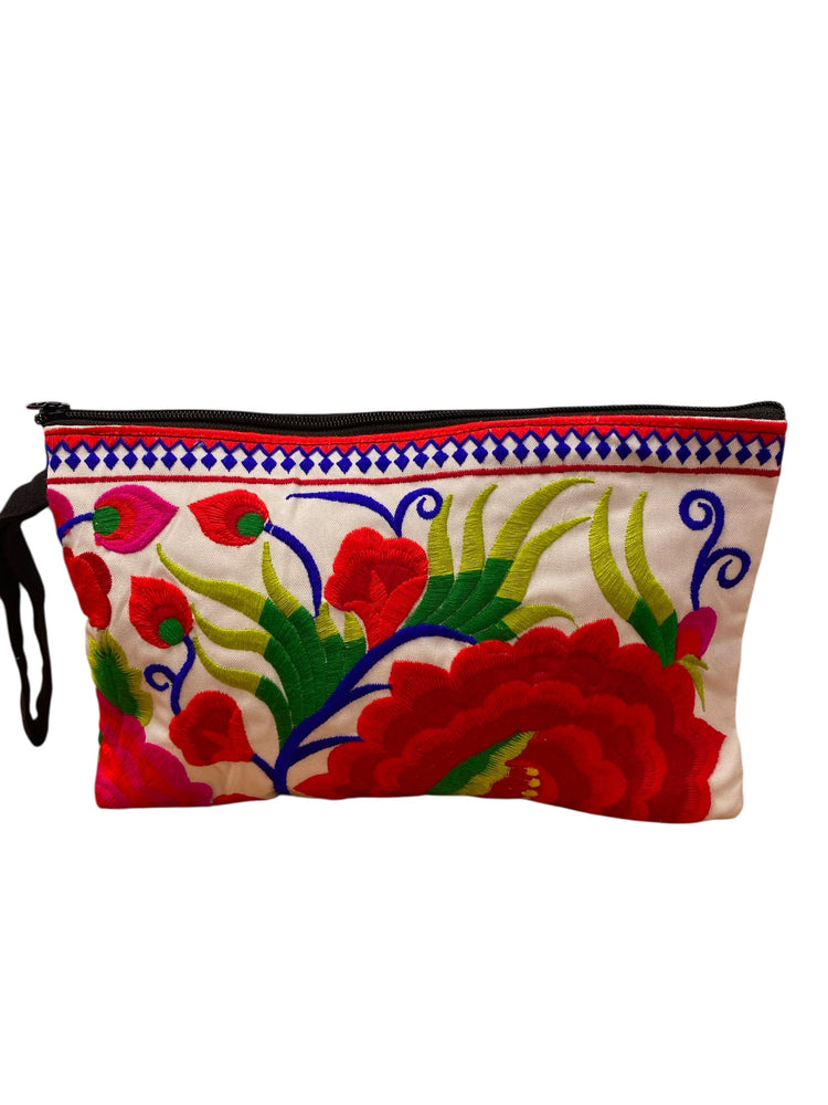 Ruby red bloom on white clutch