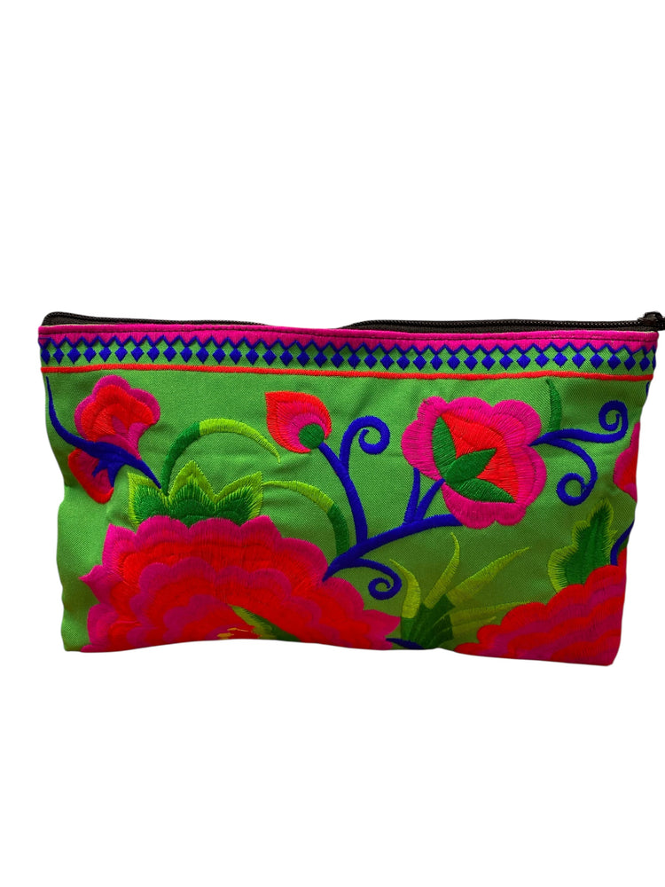 Ruby red and hot pink bloom on spring green clutch