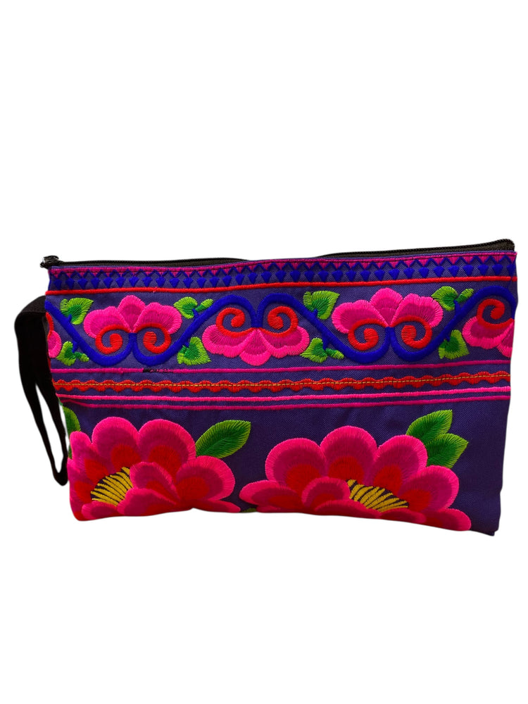 Hot pink poppy on cobalt blue clutch