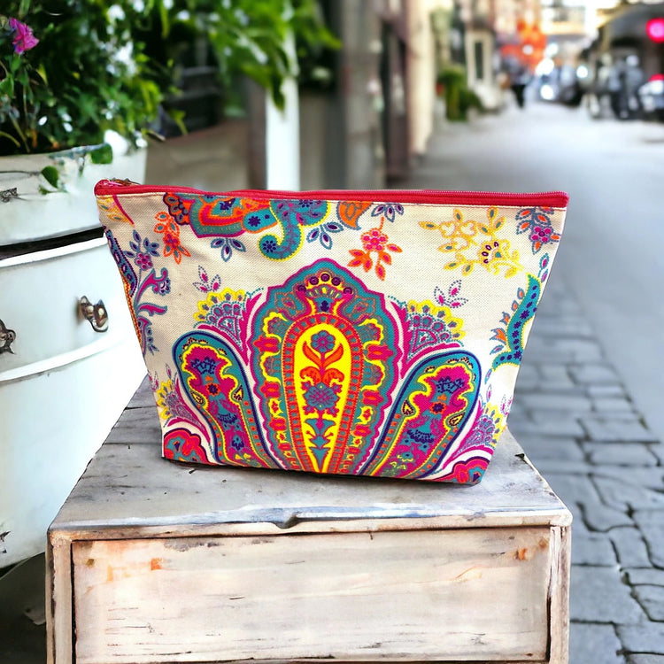 Neon yellow and vibrant pink paisley on white clutch