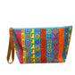 Citrus geo pattern on aqua clutch