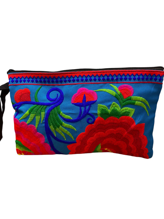 Ruby red bloom on marine blue clutch