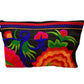 Ruby red and tangerine bloom on licorice clutch
