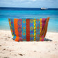 Citrus geo pattern on aqua clutch